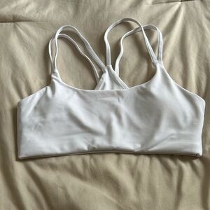 XS white fabletics sports bra, never worn only tried on.